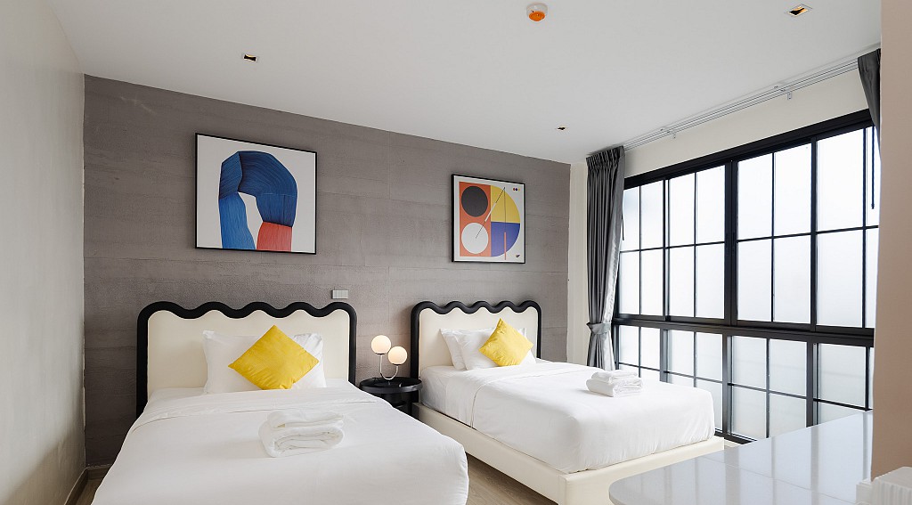 Laa Laa Deluxe Twin Beds Room